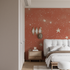 Terracotta Wallpaper with Golden Shooting Stars | Murals Wallpaper
